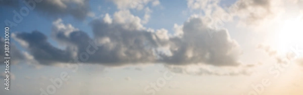 Obraz grey clouds at sunset