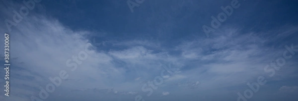 Obraz blue sky with white clouds