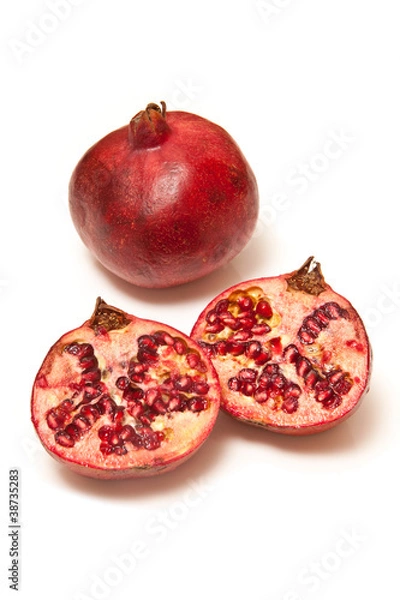 Obraz Pomegranate isolated on a white studio background.