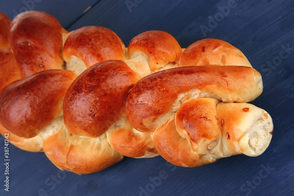 Obraz golden challah on blue