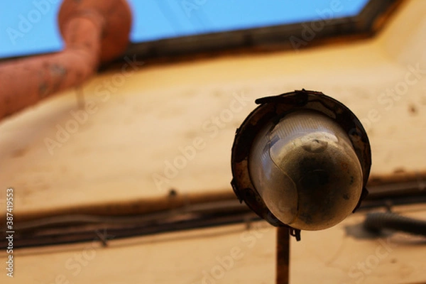 Obraz street lamp on the house