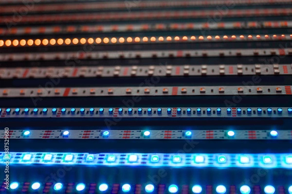 Fototapeta Defocused lights of LED strip, abstract background lights