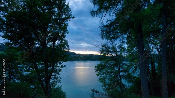 Obraz Sunset on a lake with pontoon