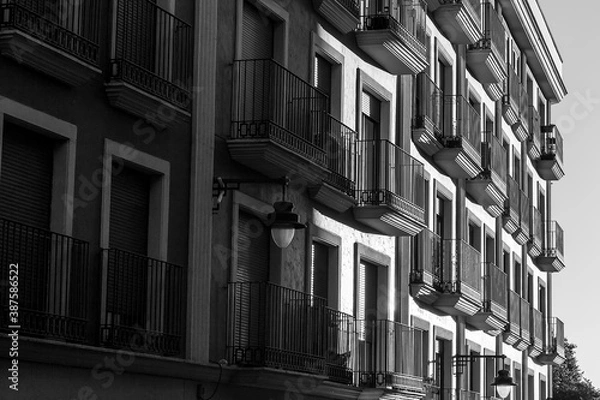 Fototapeta View of an old house facade with lot of balconies in Alcoi.