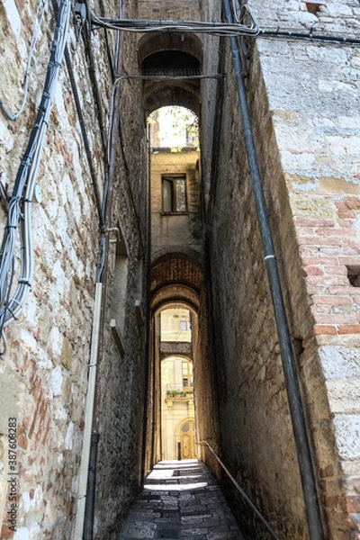 Fototapeta Authentic alley in small village in tuscany in Italy