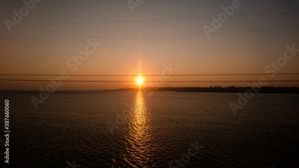 Obraz sunset over the river