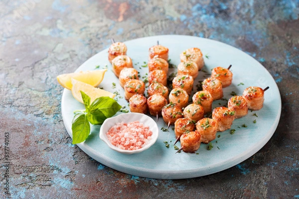 Obraz Bacon wrapped scallops skewers, selective focus