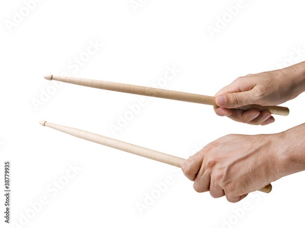 Fototapeta Hands playing with drums sticks on white