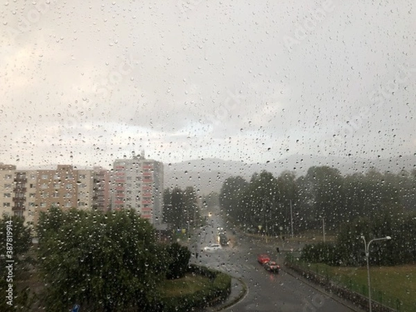 Obraz Rainy intersection from behind window.