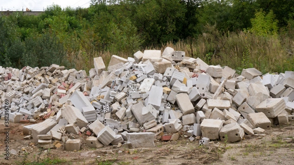Fototapeta Big pile of broken bricks and silicate blocks