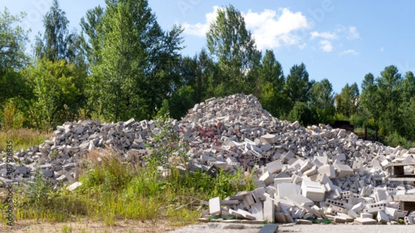Fototapeta Landscape with pile of broken bricks and silicate blocks