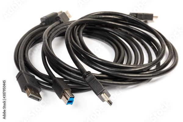 Fototapeta Different multimedia and computers interface cables closeup in selective focus