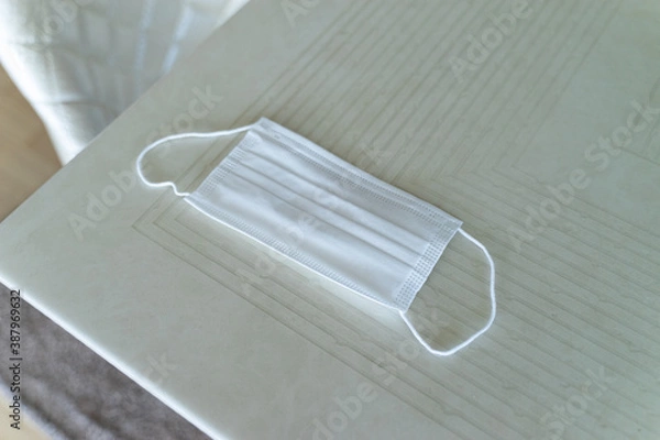 Fototapeta a mask on a table