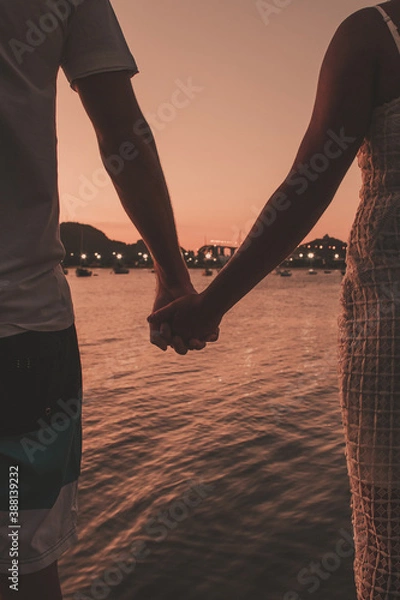 Fototapeta couple on the beach