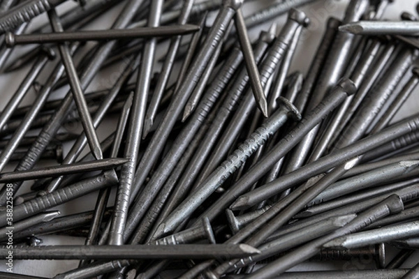 Fototapeta Extereme close up of a pile of metal nails