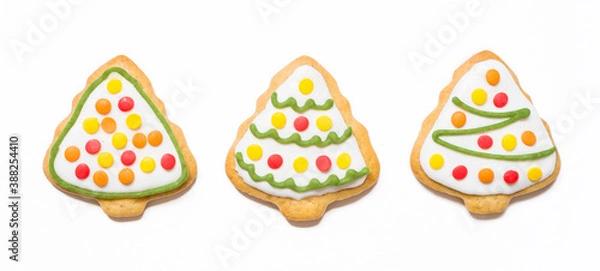 Fototapeta Christmas cookies in the form of trees on isolated white background