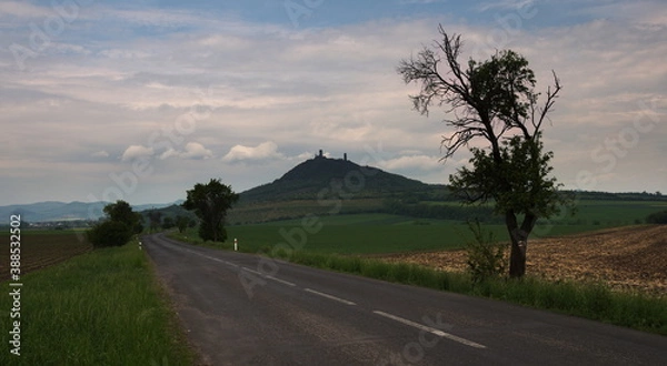 Fototapeta Distant view of Hazmburk castle. A dominant landmark of the Central Bohemian Uplands, Czech Republic.