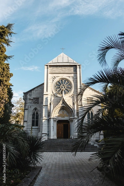 Fototapeta cathedral between tropical trees