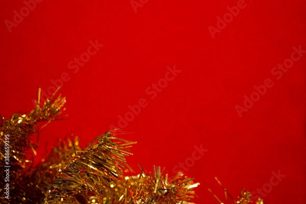 Fototapeta Template for a new year card with a Golden Christmas tree and a red background