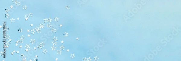 Obraz multiple silver stars on blue background banner