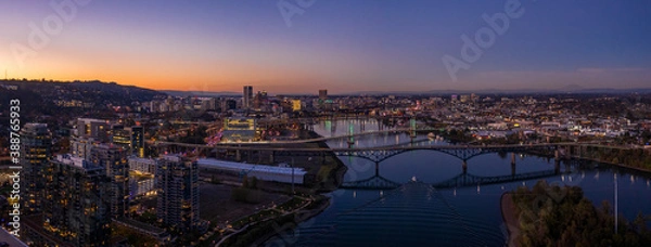 Fototapeta South Portland Oregon on the Waterfront looking towards Downtown with Drone at Sunset
