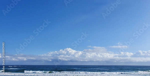 Fototapeta Clouds over the sea