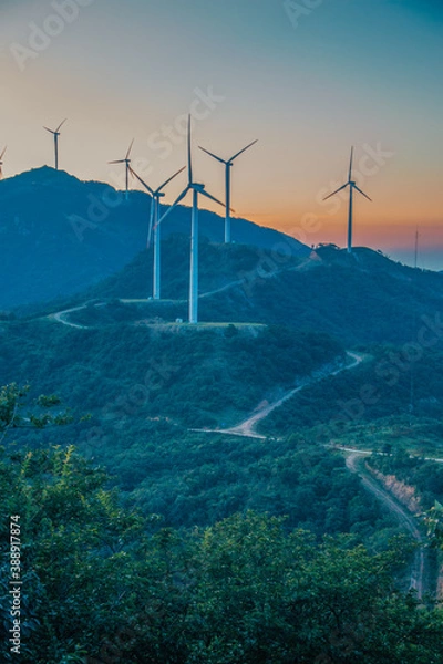 Obraz Wind power windmill on the mountain