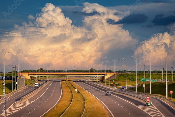 Fototapeta expressway s17 s12 against the background of storm clouds