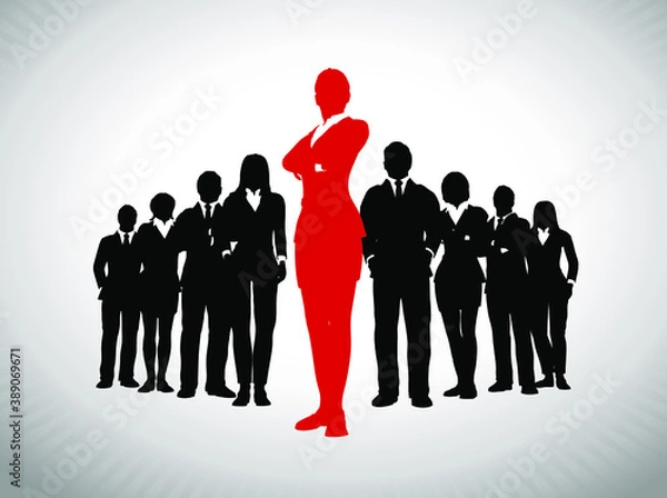 Fototapeta Remarkable Female Leader in front of large team of successful executives. A large team of successful executives in silhouettes led by a great remarkable Female leader in red who stands in front of the