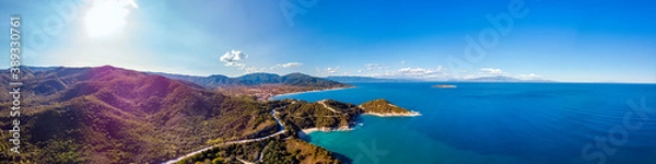 Fototapeta Drone aerial view of sea and rocks in Olympiada, Halkidiki, Greece