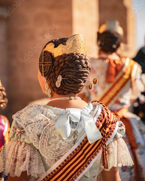 Obraz Young woman using a traditional fallera custom in Valencia - Falleras de valencia is a famous tradition celebrated every year