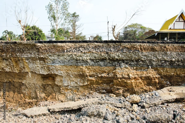 Obraz Layer of soil beneath the asphalt road.