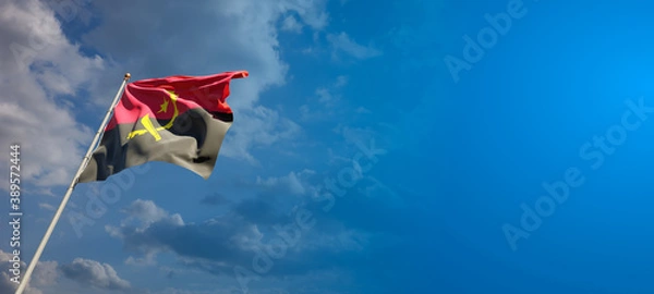 Fototapeta Beautiful national state flag of Angola with blank space. Angola flag on wide background with place for text 3D artwork.
