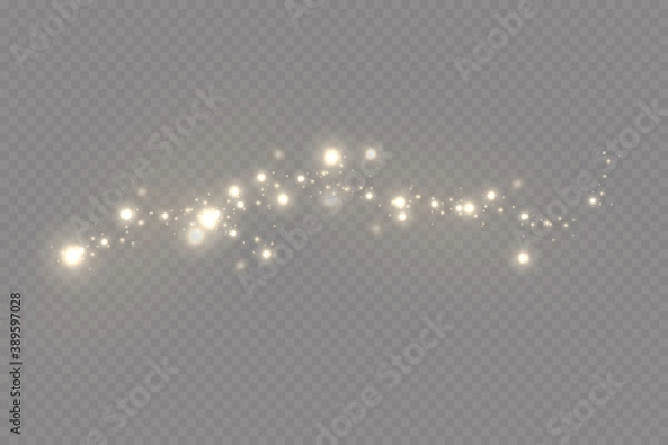 Obraz Świąteczny efekt świetlny. Lśniące magiczne cząsteczki pyłu, iskry pyłu i złote gwiazdy świecą specjalnym światłem.