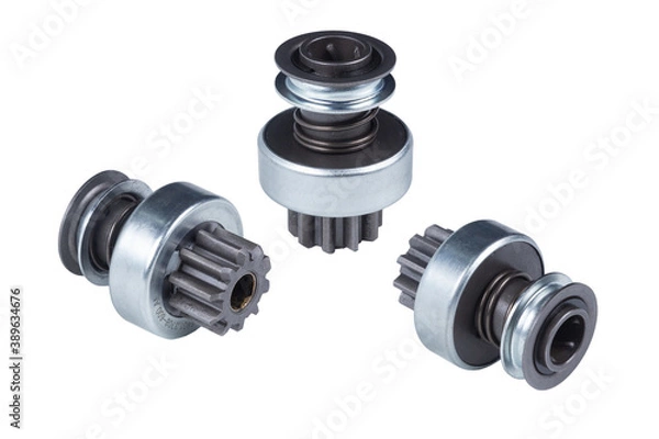 Fototapeta set of three car starter Drives, Bendix. Starter detail isolated on a white background close-up. Spare parts.