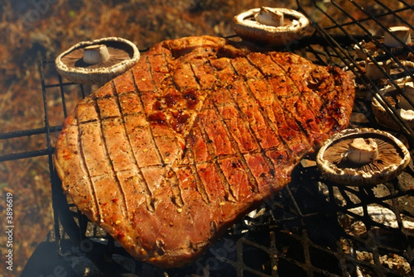 Fototapeta Texan steak grilled with mushrooms