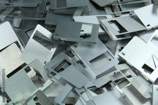 Fototapeta Aluminium parts from old disks to be recycled
