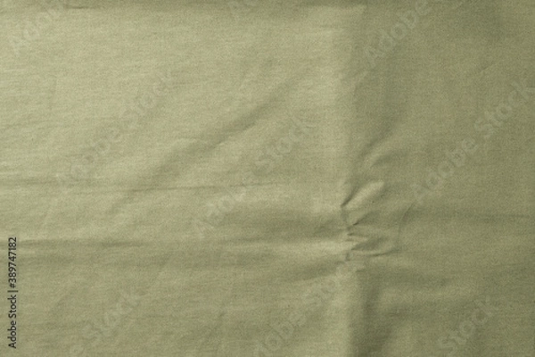 Fototapeta Linen tablecloth, background for text, green, olive color. Fabric texture
