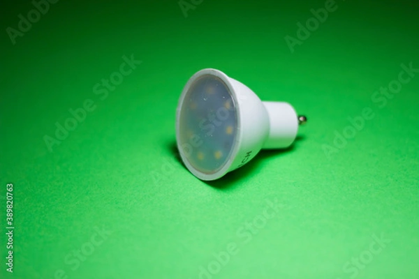Obraz led lamp on a green background