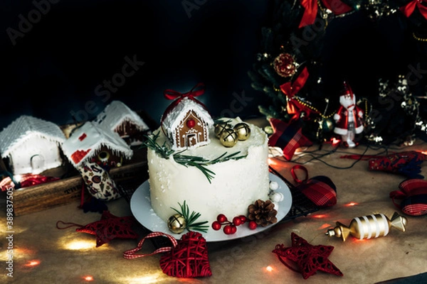 Fototapeta white christmas cake with decorations