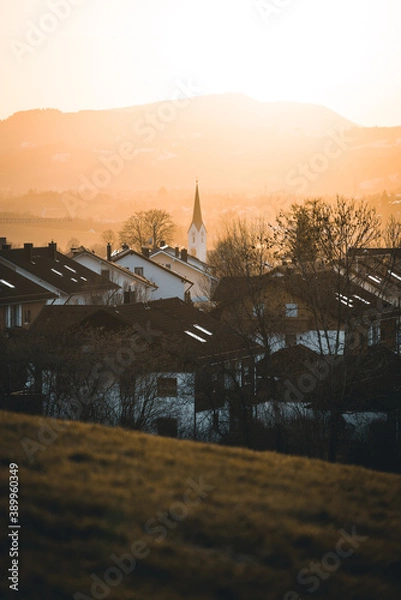 Obraz sunset behind a rural village