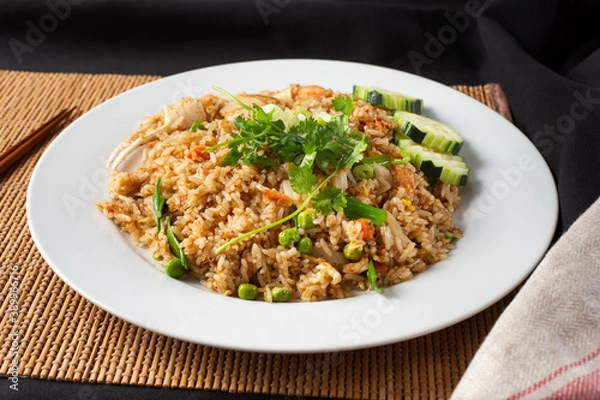 Fototapeta A view of a plate of crab fried rice.