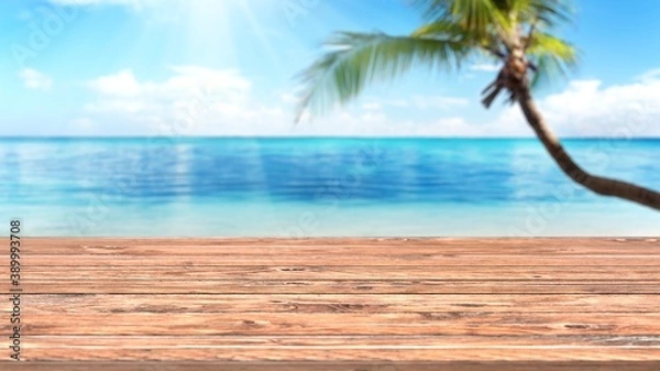 Fototapeta Empty wooden planks with blur beach on background, can be used for product placement. 3D render