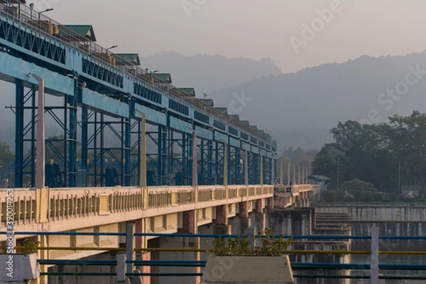 Fototapeta a dam & a bridge over the river