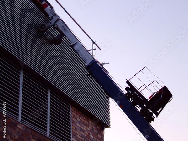 Obraz Lastenaufzug bei Sonnenuntergang