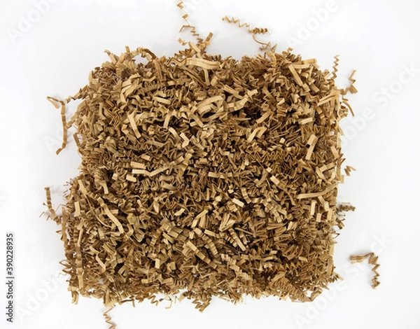 Obraz Shredded brown paper packaging material.