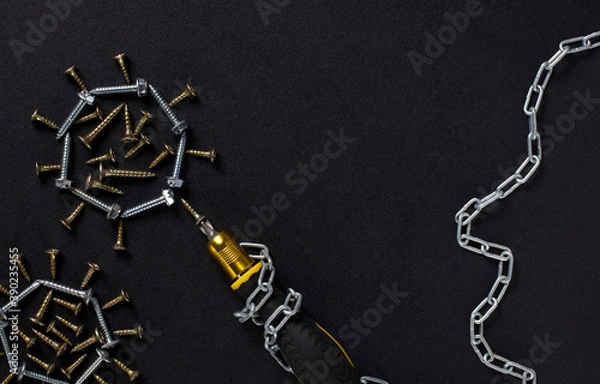 Fototapeta head contour in the form of a metal chain, a kind of virus in the form of a self-tapping screw, a screwdriver. background for text. Invention, modification of the virus. COVID-19