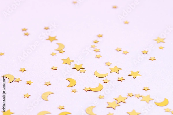 Fototapeta Christmas modern composition. Golden decorations, confetti on white background. copy space