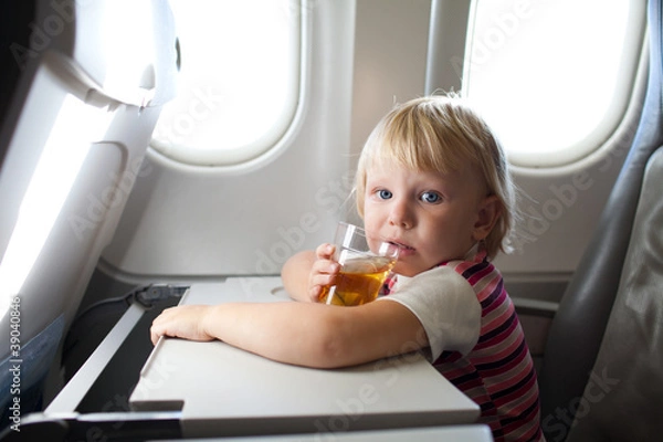 Fototapeta child in airplane