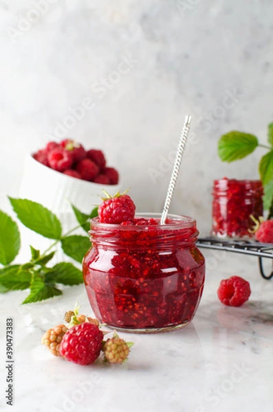 Fototapeta Homemade jam made from ground raspberries and sugar